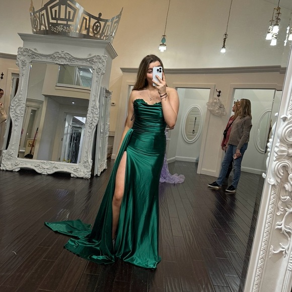I'm selling my Junior year prom dress! It is a green Sherri Hill and a